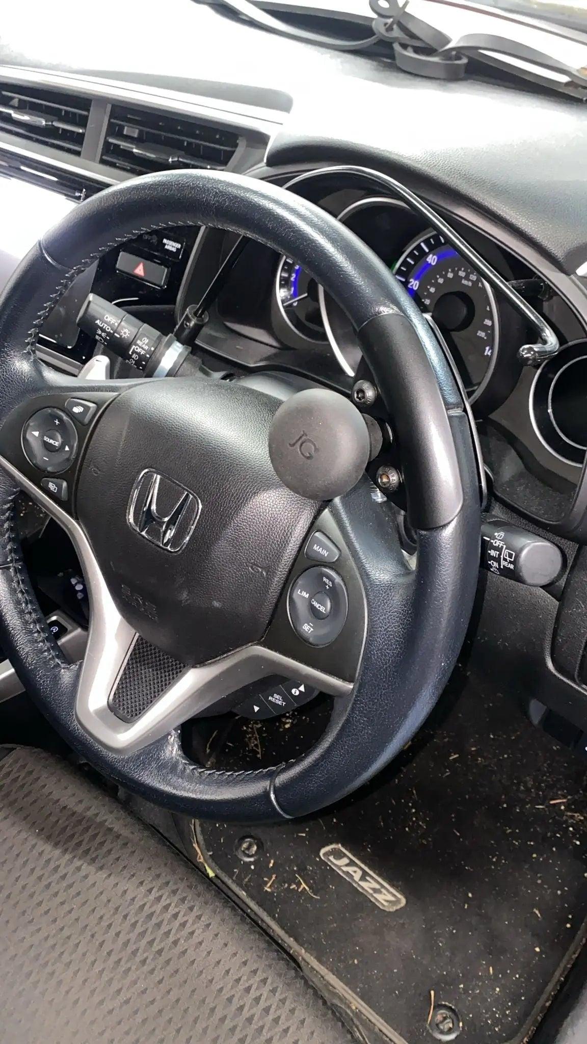 Enhancing Control: Installing an Indicator Crossover Bar and Steering Ball in a Honda Jazz